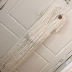 White lace bohemian romper/dress. Built in shorts